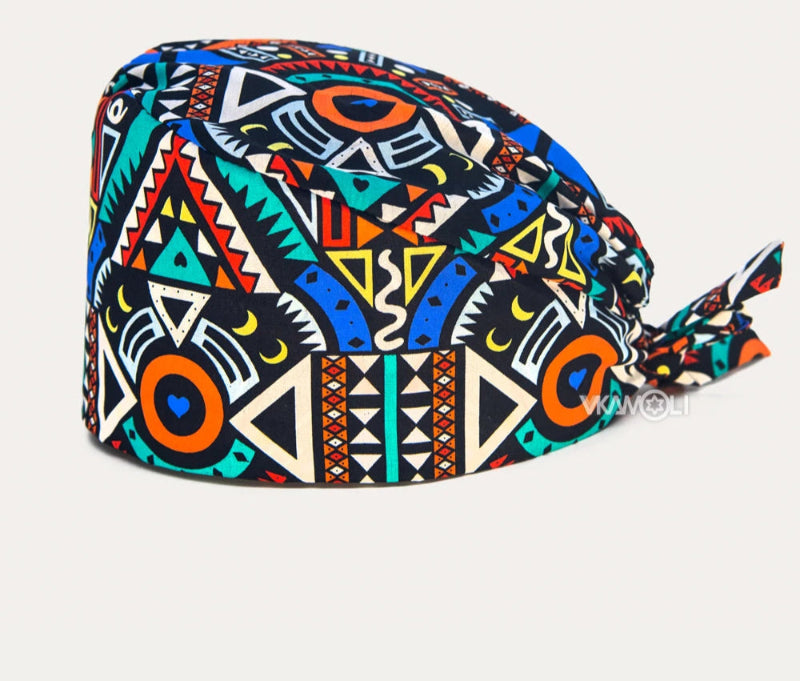 Check out these the Flower-Printed OR Caps! You know, because nothing says 'I'm a professional' like wearing a cap that looks like a garden party exploded on your head - Healthcare Vibes